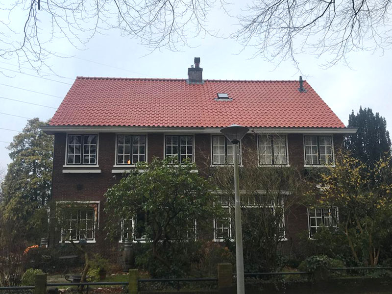 Dakpan renovatie groot rood dak